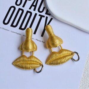 Schiaparelli Inspired Elegant Gold Statement Earrings